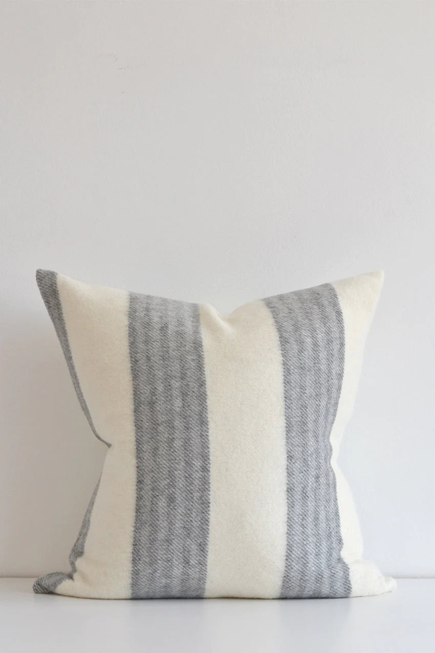 Made in Canada, this stunning pillow is soft to the touch with a contemporary horizontal stripe. This pillow looks great in any decor. Made of 55% Alpaca 45% Wool Size: 22x22" Designed and made in Canada Pillow cover only