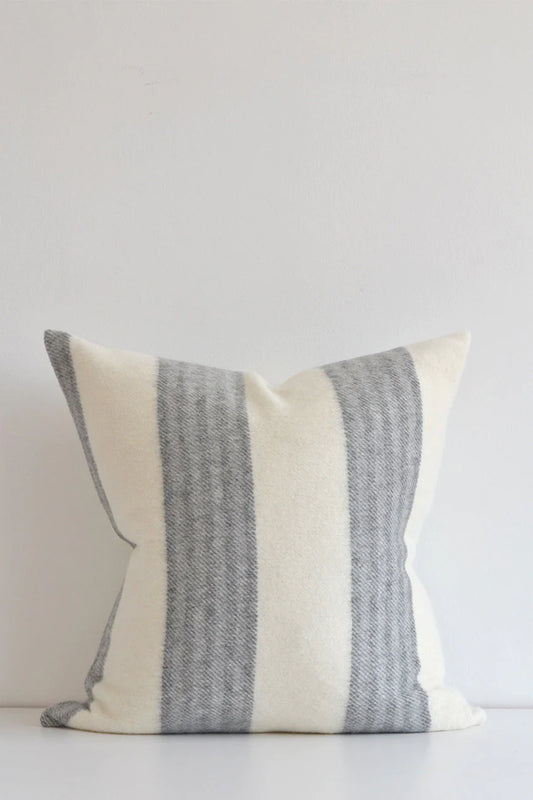 Made in Canada, this stunning pillow is soft to the touch with a contemporary horizontal stripe. This pillow looks great in any decor. Made of 55% Alpaca 45% Wool Size: 22x22" Designed and made in Canada Pillow cover only