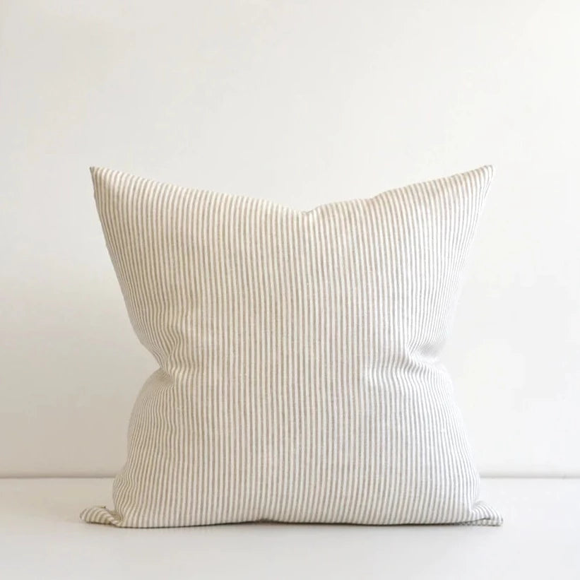 Luxurious and soft to the touch this beautiful linen pillow cover is made from the finest Oeko-Tex certified 100% European linen. The thin vertical stripes on this classic pillow cover will add interest to any room. The neutral tones work with any decor. Designed and crafted in Canada it is easy to care for with a zipper closure and machine washable. Size is 22" x 22" Inserts not included