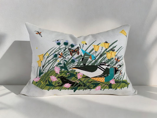 Pillow cover crafted from 100% certified organic cotton printed with Modernist artist Charley Harper’s Once There Was a Field features an exposed contrasting zipper.