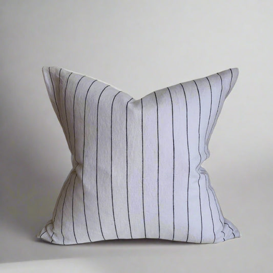 Mixing French countryside charm with modern farmhouse style, our elegant yet casual Pinstripe Linen Pillow Covers feature 100% Oeko-Tex® certified linen and an exposed YKK zipper. The fabric has been specially washed for a soft touch and minimal shrinking, making it a timeless addition to any home or cottage. Made to order. These pillow covers are handmade in Canada. Pillow cover only - insert not included. Size: 18 x 18
