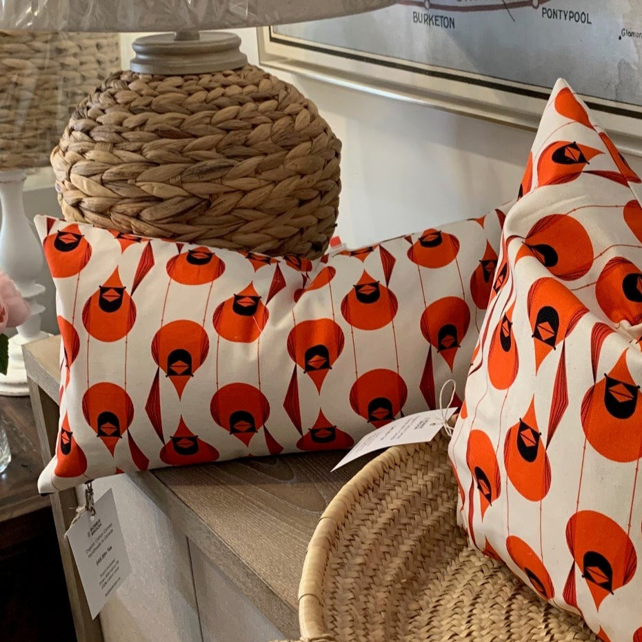 Fabulous and fun, these stylized Cardinal pillow covers are handmade with 100% organic cotton canvas printed with artist Charley Harper’s Cardinal design. The fabric is soft yet sturdy ensuring a long lasting pillow cover. Features an exposed warm white YKK metal zipper. The striking colors will enliven your indoor and outdoor space.  Made to order. These pillow covers are handmade in Canada.  Does not include insert.    Size 12 x 20