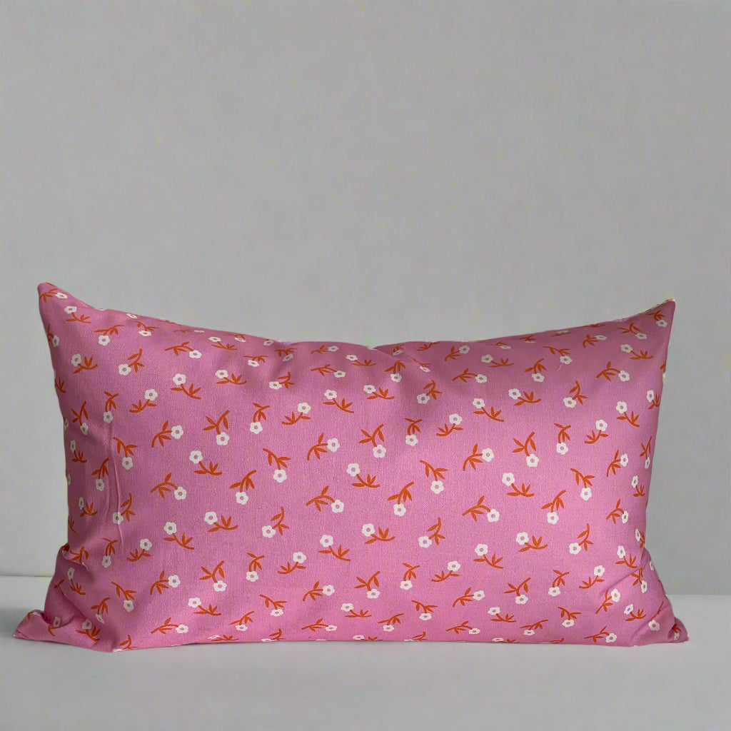 Handcrafted in Canada, the Pink Petal Party pillow is super sweet! Made from GOTS certified organic cotton. It's soft to the touch with an exposed orange zipper adding a another pop of colour to this beautiful fabric. Add a touch of whimsy and joy to your home, cottage, bunkie, or sunroom.