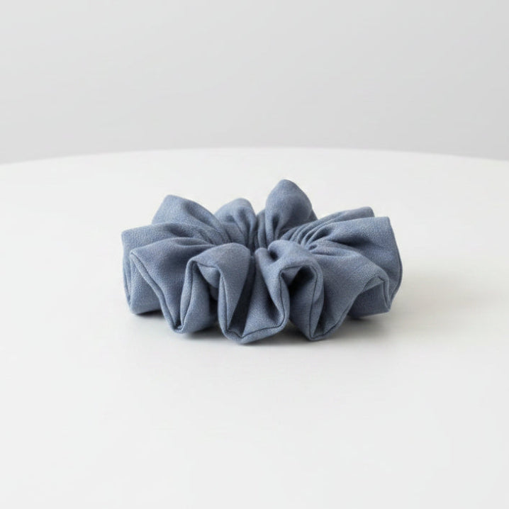 hair scrunchies in various patterns and colors (blue and white floral, blue and white stripes, solid cottage blue,