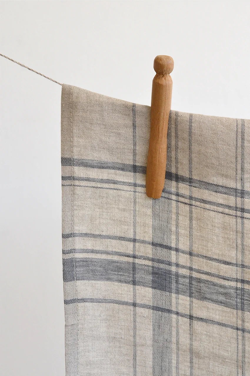 This understated plaid will be your favorite kitchen towel. Made from 100% linen, this towel will dry tons of dishes. Hand made in Canada from European linen. 100% European linen 21x27