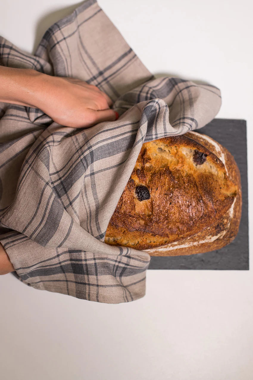 This understated plaid will be your favorite kitchen towel. Made from 100% linen, this towel will dry tons of dishes. Hand made in Canada from European linen. 100% European linen 21x27