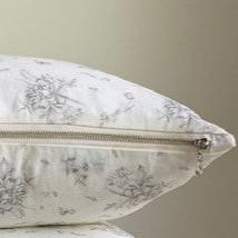 These stunning 100% linen pillow covers are made from the finest Oeko-Tex® certified linen in warm white and Dark Grey florals. With an exposed metal zipper, this linen has been washed to produce a soft to the touch finish and reduced shrinking. They are luxurious yet casual, a classic that will accentuate any home, office or cottage.