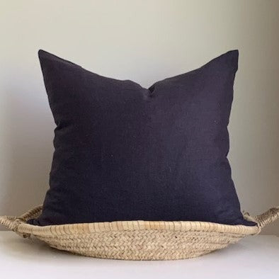 Oeko-Tex certified linen pillow cover in Graphite Blue with a Seal Grey contrasting exposed zipper.