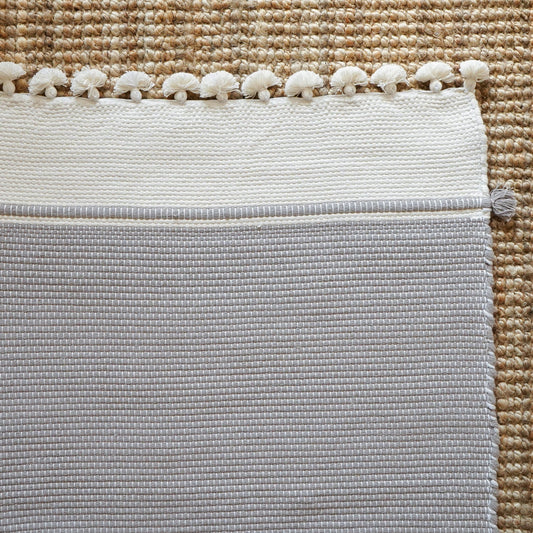 Ethically handwoven and luxurious, this 100% cotton mat