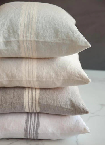 Create French country chic with sustainable, stone-washed 100% linen pillow covers. We've got four colors to choose from, all crafted with love in Canada! Spectacularly soft to lounge on, but strong enough to last through the seasons. Designed and made in Canada  100% European linen, Oeko-Tex certified  Size is 18" x 18" Inserts not included  