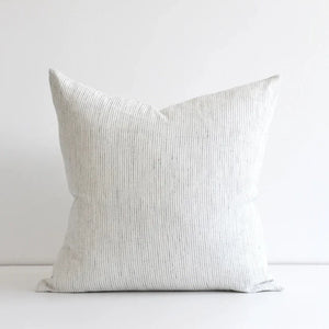 This linen pillow cover features dapper dashes and dots for a fashionable and one-of-a-kind look that works with any decor. Crafted from sumptuous & sustainable 100% linen and made in Canada, it's easy to care for, machine washable with zipper closure - so lux! Size 22 x 22 Made in Canada Machine washable  Inserts not included