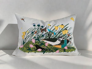 Pillow cover crafted from 100% certified organic cotton printed with Modernist artist Charley Harper’s Once There Was a Field features an exposed contrasting zipper. 