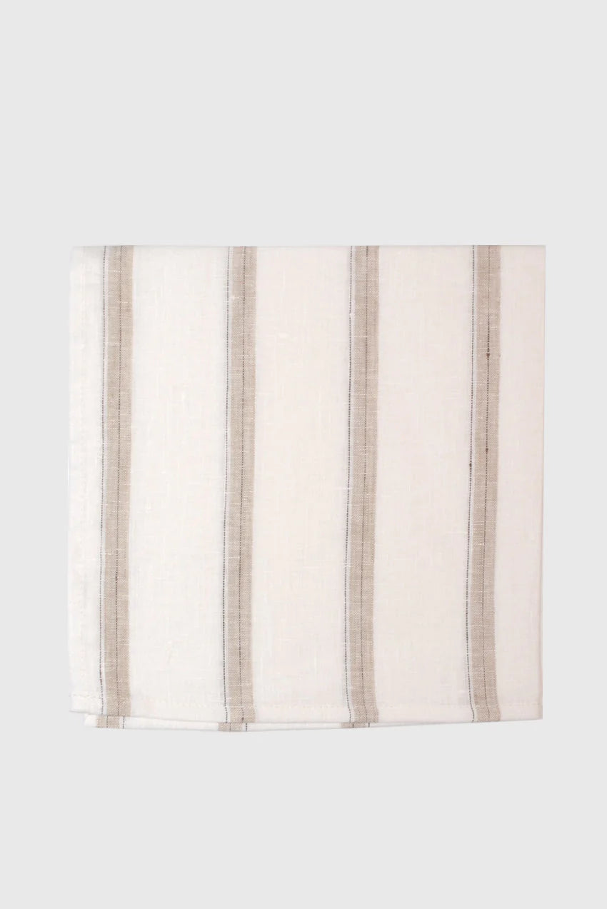 Beautifully crafted in Oeko-Tex linen, these light weight napkins have an off-white base with  sand tone and black vertical stripes. Perfect for fancy or fuss free tables, these napkins are sustainable, absorbent, lint free and gorgeous!   100% linen Size is 18x18" Designed in Canada and made in Europe  Machine washable