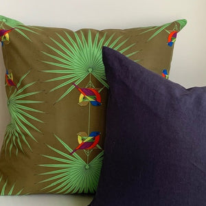 This stunning pillow cover is handmade from 100% unbleached organic canvas printed with artist Charley Harper’s Flamboyant Feathers design. The pillow features a beautiful blue exposed YKK zipper. Accompanied by a graphite blue linen pillow cover.The striking colors will enliven your indoor and outdoor space.