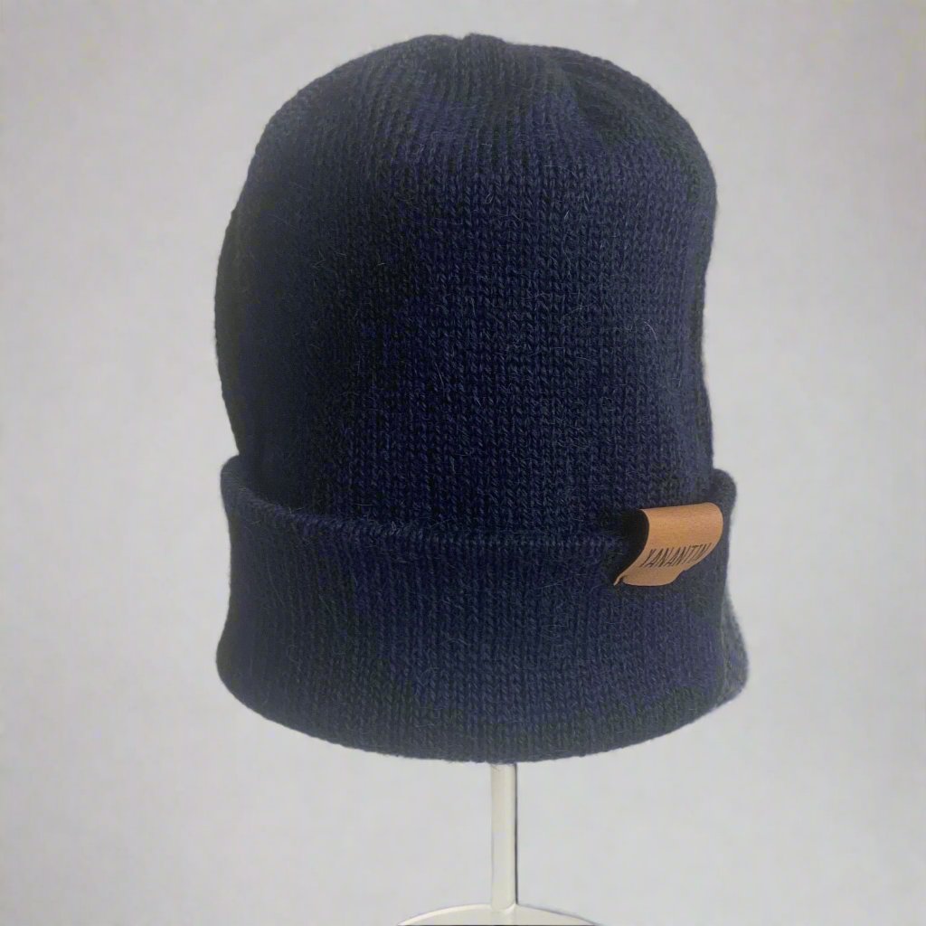 Dark Blue colour, soft and ethically produced hats are crafted with 100% Superfine Alpaca wool. They are warm, water repellant and wind resistant. And Alpaca wool is breathable so no sweaty heads! With a reversible label you can wear your Beanie rolled up or slouchy.

Yanantin hats are handmade in Bolivia by a network of independent knitters who earn a good income in a safe and happy environment. You will look great and feel good knowing your Beanie is empowering women in Bolivia 