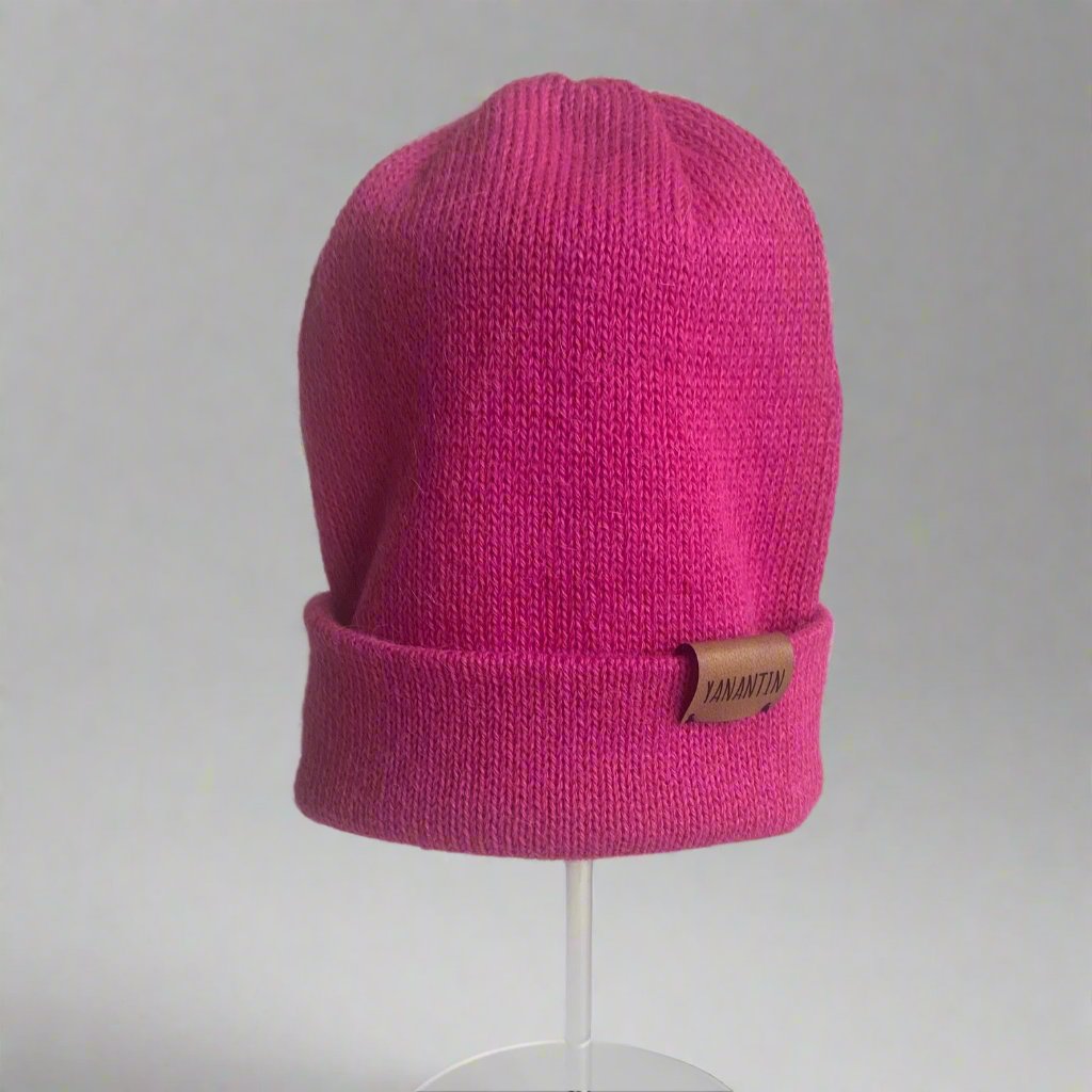 Fuschia colour, soft and ethically produced hats are crafted with 100% Superfine Alpaca wool. They are warm, water repellant and wind resistant. And Alpaca wool is breathable so no sweaty heads! With a reversible label you can wear your Beanie rolled up or slouchy.

Yanantin hats are handmade in Bolivia by a network of independent knitters who earn a good income in a safe and happy environment. You will look great and feel good knowing your Beanie is empowering women in Bolivia 