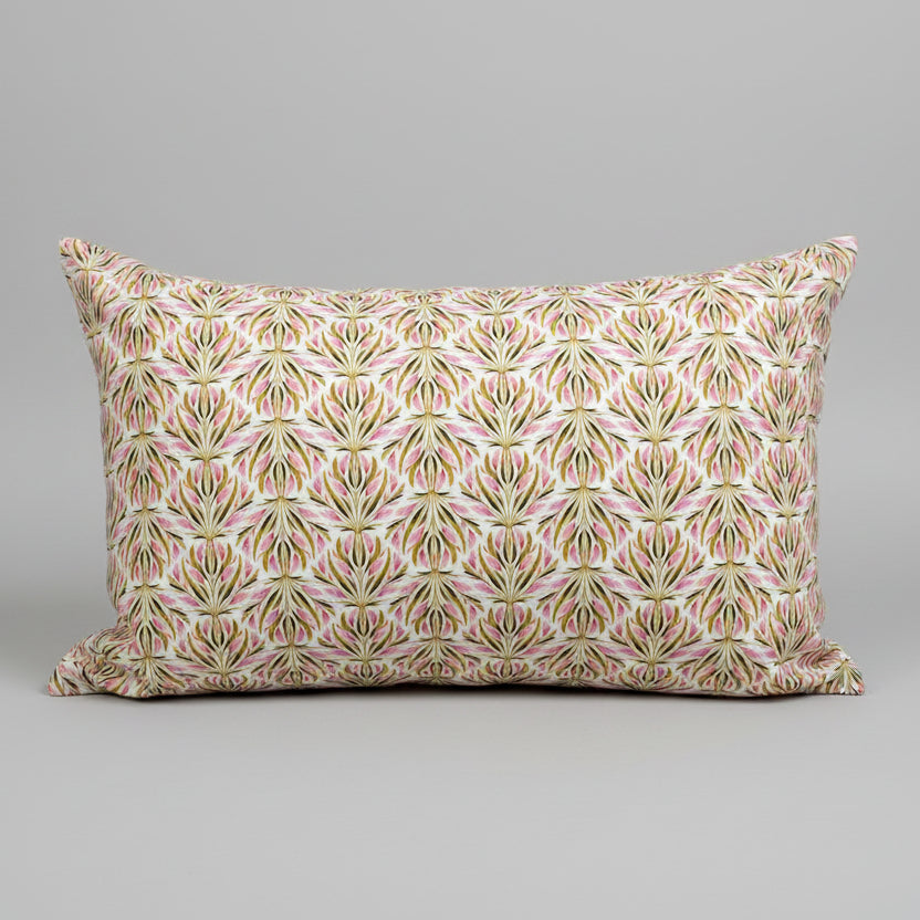 Capture spring's fresh palette with this handcrafted organic cotton lumbar pillow with soft pink flowers and lush green grasses. Made in Canada with GOTS certified cotton, these pillow covers are soft to the touch and feature an exposed zipper detail.

About our Pillows
Lumbar size: 14" x20" &nbsp;
GOTS certified Organic Cotton
YKK Zippers produced in Canada
Machine washable, gentle cycle, warm