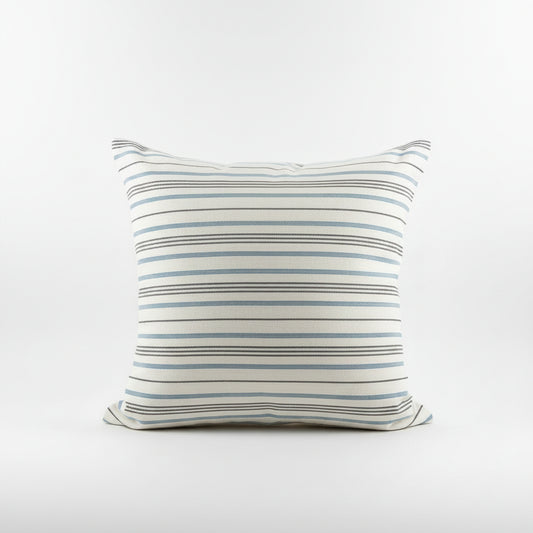 A square throw pillow with a striped pattern in light blue, navy on an off-white background,