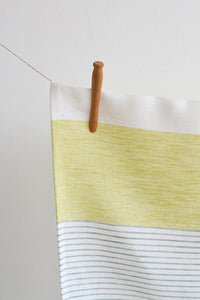Enliven your kitchen with a set of 2 Ibiza Linen Tea Towels! Our absorbent, quick drying, and lint-free towels are made from eco-friendly Oeko-tex certified European linen – setting them apart from the average kitchen towel! In Cream, Chartreuse, and Dusty Green, these towels bring fresh beauty to your kitchen. Who knew drying dishes could be stylish?    Designed and made in Canada  Machine washable, warm. Dry on low setting. No bleach Size: 20 x 28"