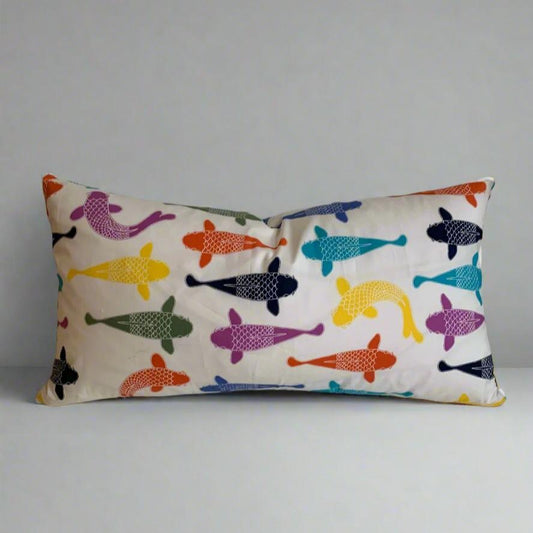 Add a splash of color and humor to any space with our Playing Koi Organic Cotton Pillow. Made from 100% organic cotton and handmade in Canada, this soft pillow cover features a whimsical design of brightly colored Koi fish. Perfect for any age or style.  100% Organic Cotton, handmade in Canada.  Size:12" x 20"&nbsp;