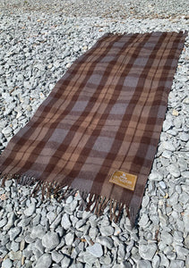 The Beautiful Outlander throw is soft, warm and just the right size to keep your legs and toes cozy, or throw it around your shoulders. Wrap yourself in an official Outlander Tartan, the symbol of a love that travelled across time. From Highland battlefields to misty moors, timeless standing stones to Fraser’s Ridge the Outlander throw is a cozy choice for home, cottage or sporting events.   Size: 69″x 31″ / 175cm x 79cm, 3"/ 7.5cm fringe  The Responsible Wool Standard