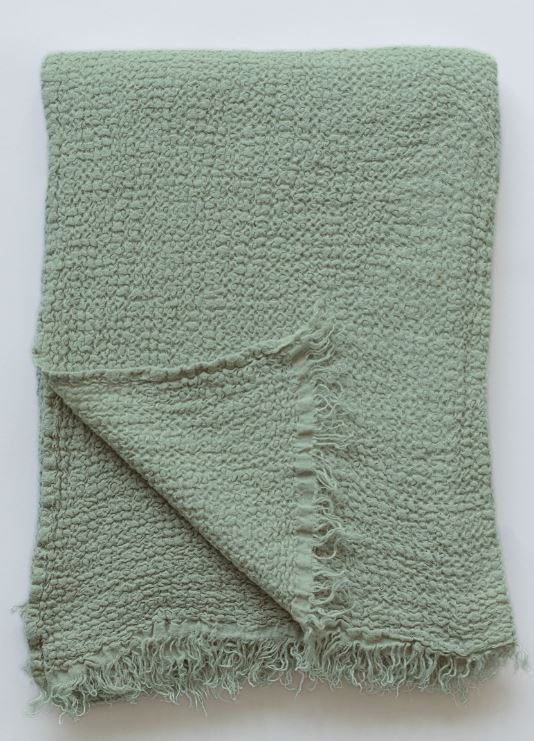 Moss Green textured European linen throw with fringe edges on a white background