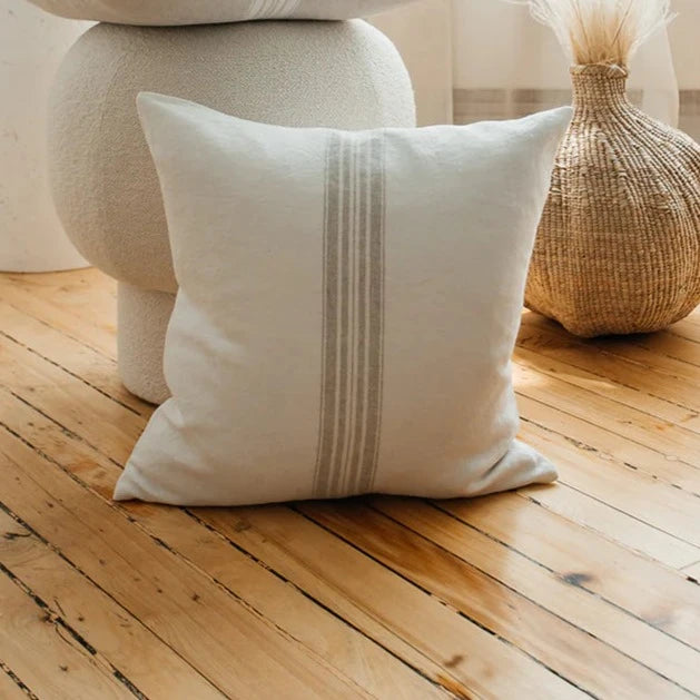 White with Beige Stripe Create French country chic with sustainable, stone-washed 100% linen pillow covers. We've got four colors to choose from, all crafted with love in Canada! Spectacularly soft to lounge on, but strong enough to last through the seasons. Designed and made in Canada  100% European linen, Oeko-Tex certified  Size is 18" x 18" Inserts not included  