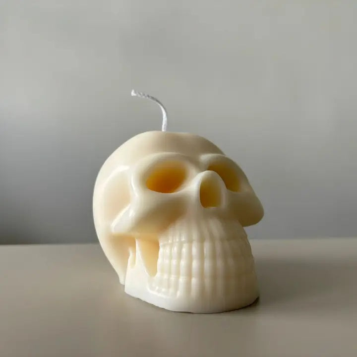 Handcrafted in Canada,&nbsp;our Spooky Skull Candle's hauntingly detailed design adds some spooky charm to any room. Crafted from eco-friendly soy wax, this candle adds an eerie elegance while being gentle on the environment.

In details:

• Size: 3.5 inches in width and 3 inches in height&nbsp;

• Weight: 280g (9.88 oz)