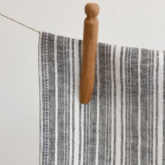 Absorbent, lint free and long lasting, this sustainable European linen with vertical stripes in different widths will work hard and look great in any space. The Sutton Collection made in Canada by Linen Way.