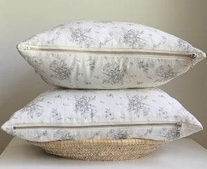 These stunning 100% linen pillow covers are made from the finest Oeko-Tex® certified linen in warm white and Dark Grey florals. With an exposed metal zipper, this linen has been washed to produce a soft to the touch finish and reduced shrinking. They are luxurious yet casual, a classic that will accentuate any home, office or cottage. 