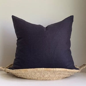 Oeko-Tex certified linen pillow cover in Graphite Blue with a Seal Grey contrasting exposed zipper. 