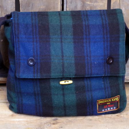 Size: 35cm x 38cm x 10cm Messenger bag is made with fine merino wool in traditional Black Watch colours of dark blue, black and green.