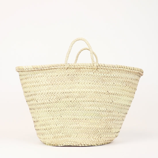 Shopping basket. Handwoven from sustainable palm leaves with natural sisal cord handles.