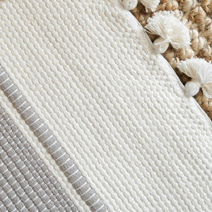 Ethically handwoven and luxurious, this 100% cotton mat 